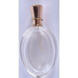 AN ANTIQUE FRENCH 18CT GOLD AND CRYSTAL GLASS SCENT BOTTLE. 8 cm high.