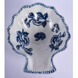 18th c Liverpool shell dish on three conical feet printed in blue with flowers under a painted borde