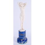 A FINE ART DECO CARVED BONE AND LAPIS LAZULI FIGURE OF A NUDE FEMALE by Joe Descomps (1872-1948). 2