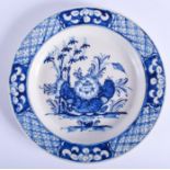 18th c. Bow plate painted in blue with a large flowers and bamboo trees. 23.5cm diameter