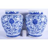 A VERY LARGE PAIR OF 17TH/18TH CENTURY CHINESE BLUE AND WHITE VASES Kangxi/Yongzheng, painted with f