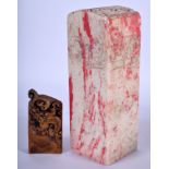 A 1930S CHINESE CARVED SOAPSTONE SEAL together with a smaller seal. Largest 15 cm high. (2)