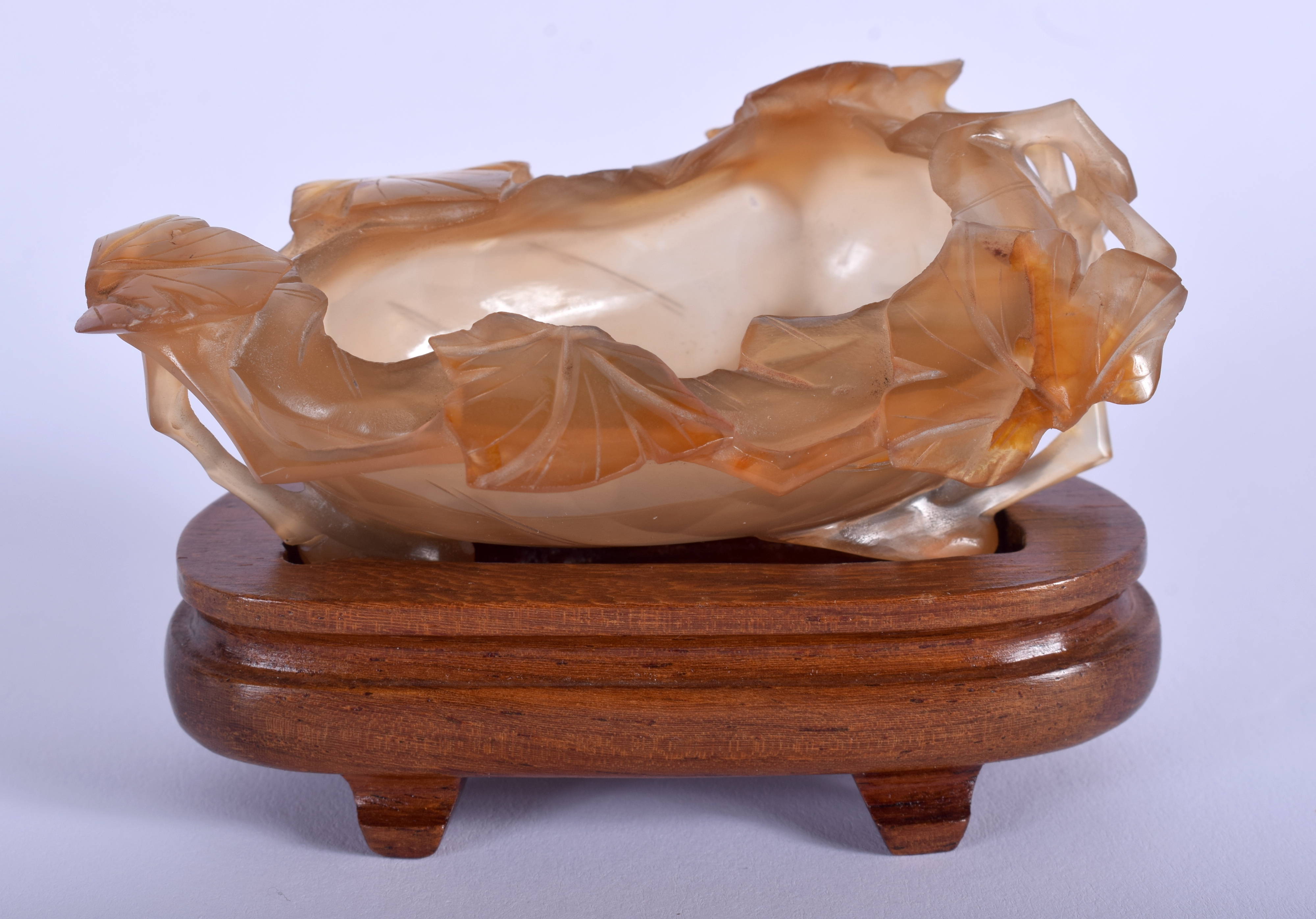 A 19TH CENTURY CHINESE CARVED AGATE BRUSH WASHER of naturalistic form. 9 cm x 7 cm.