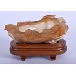 A 19TH CENTURY CHINESE CARVED AGATE BRUSH WASHER of naturalistic form. 9 cm x 7 cm.
