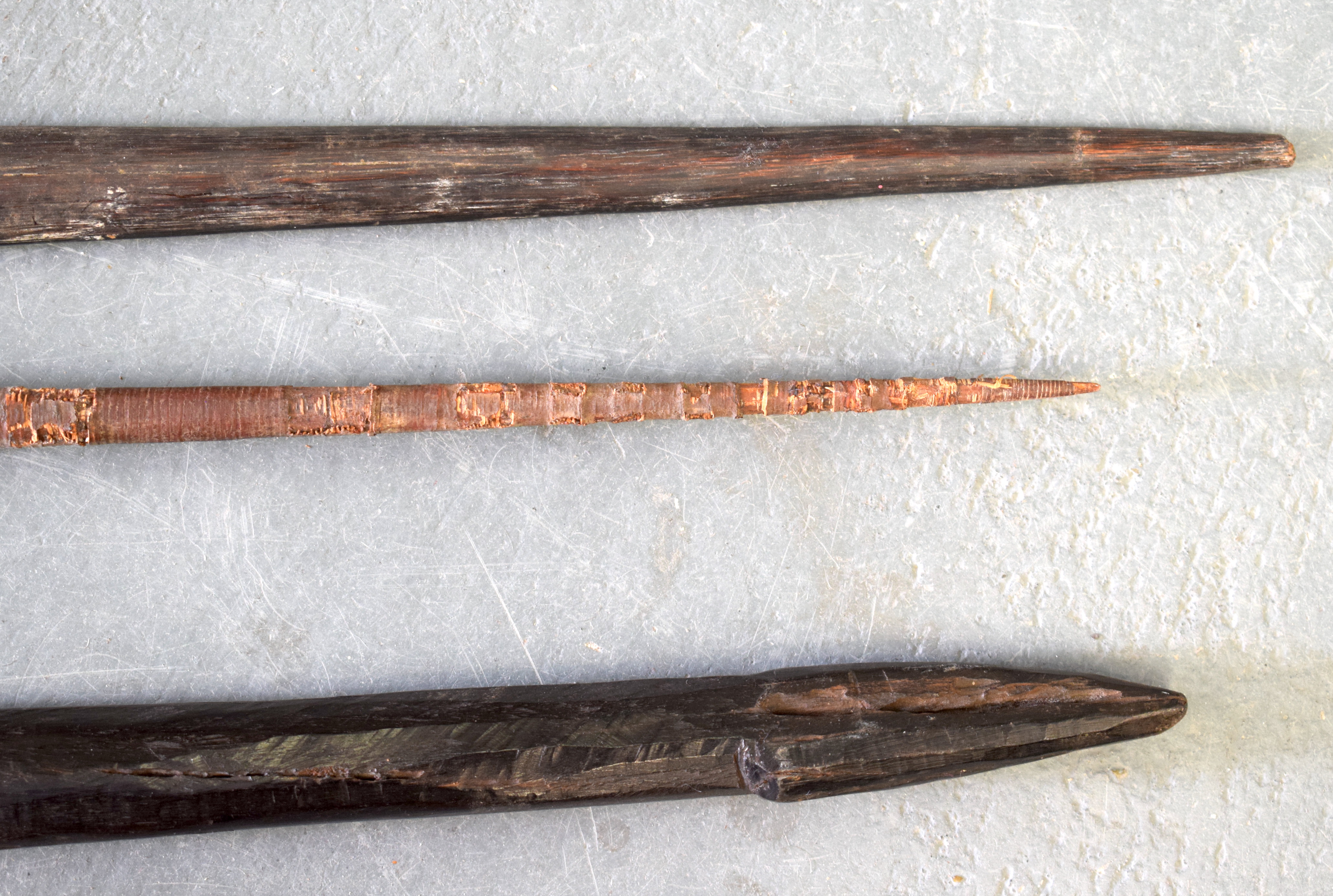 AN EARLY 20TH CENTURY POLYNESIAN TRIBAL SPEAR possibly Papua New Guinea, together with two other tri - Image 2 of 9
