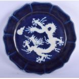 A LARGE CHINESE BLUE GLAZED PORCELAIN BRUSH WASHER painted with dragons and flaming pearls. 19 cm wi