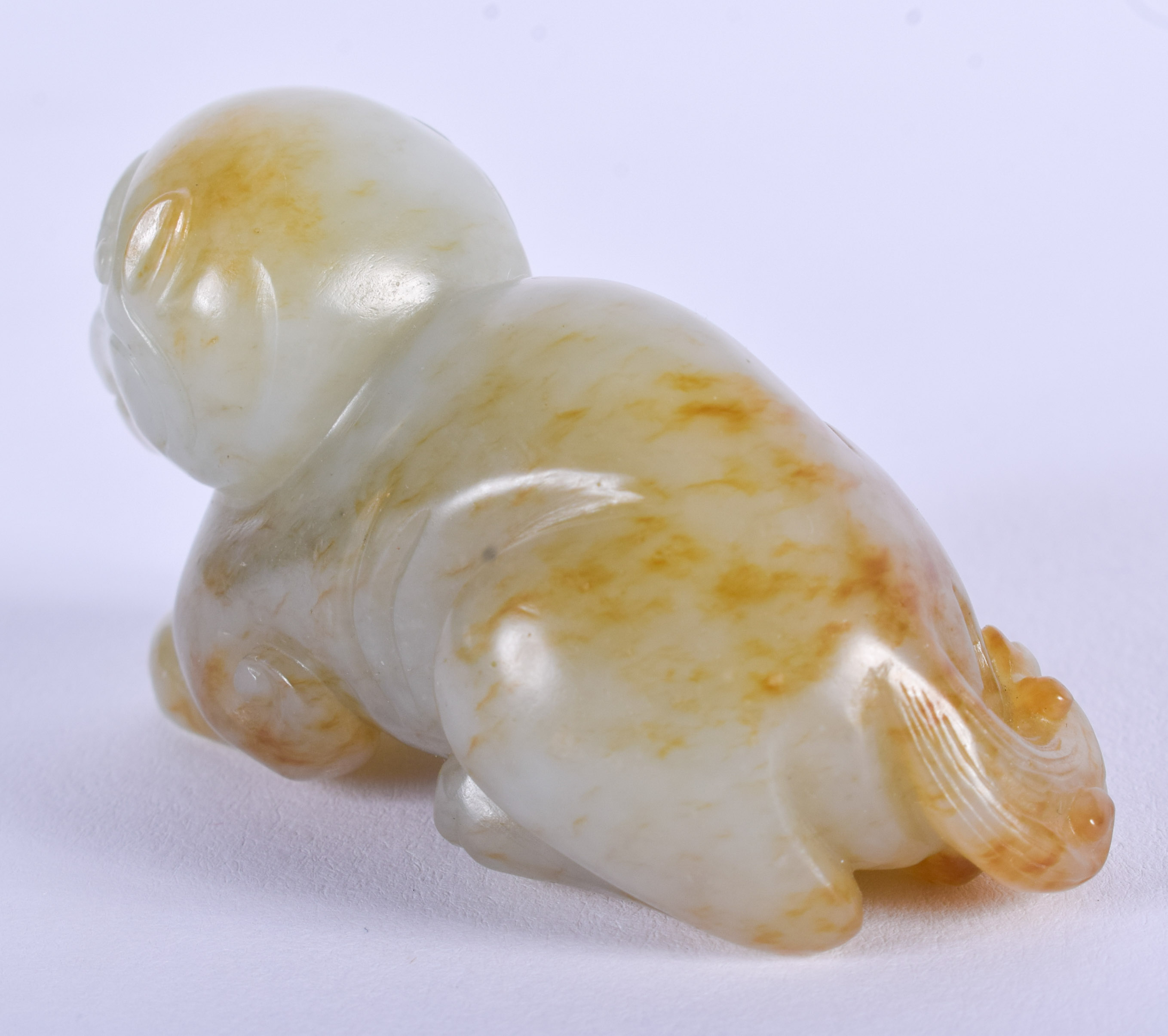 A 19TH CENTURY CHINESE CARVED GREENISH WHITE JADE BEAST Qing, with russet inclusions. 5.5 cm wide. - Image 2 of 9