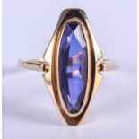 A GOLD AND BLUE GEM STONE RING. 2.9 grams. Q.