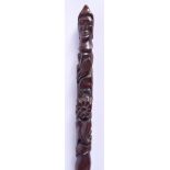 A 19TH CENTURY CONTINENTAL CARVED WOOD WALKING CANE formed with figures and foliage. 70 cm long.