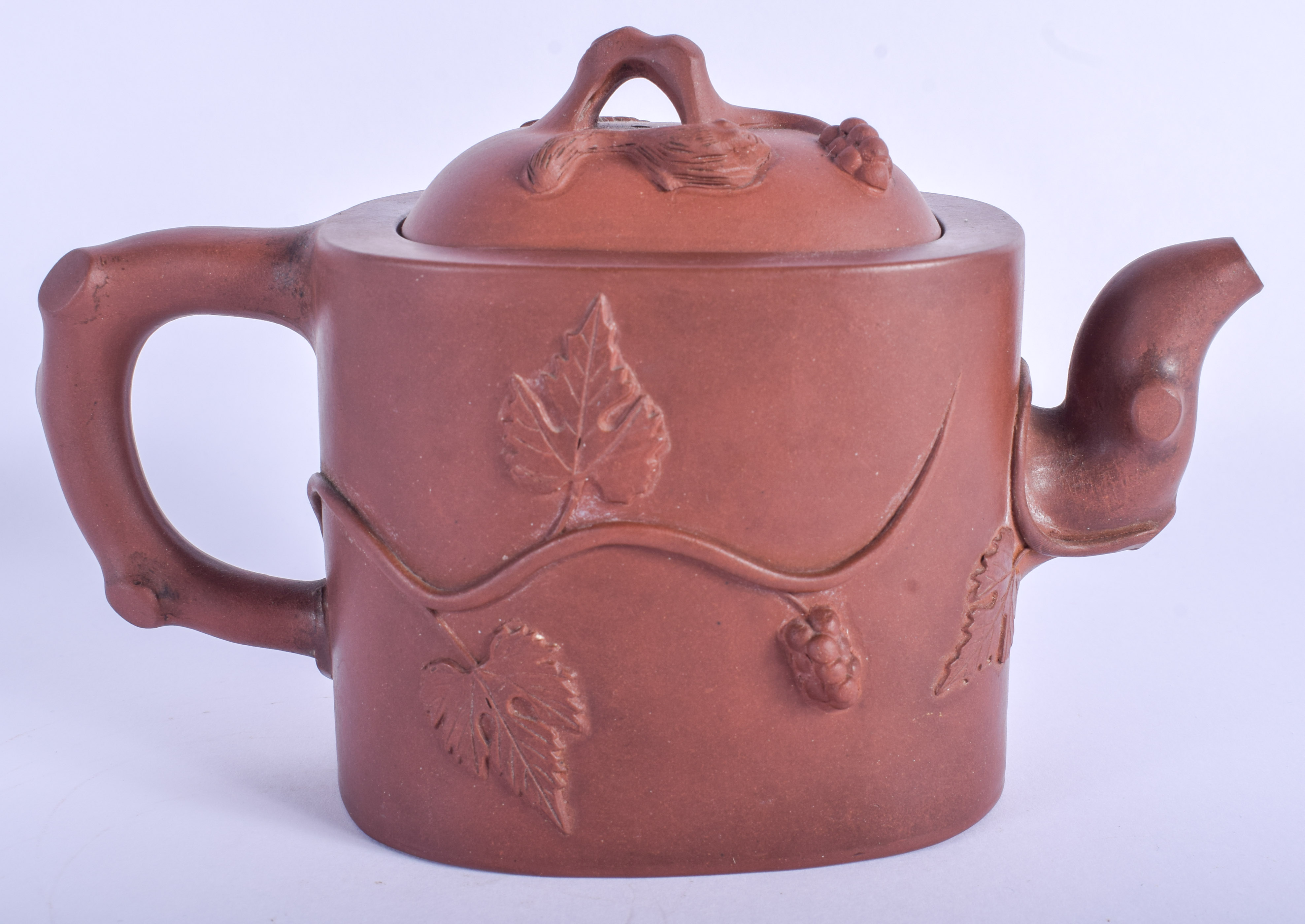 AN EARLY 20TH CENTURY CHINESE YIXING POTTERY TEAPOT AND COVER decorated with foliage. 18 cm wide. - Image 2 of 6