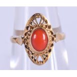 A GOLD AND CORAL RING. 2.1 grams. L.