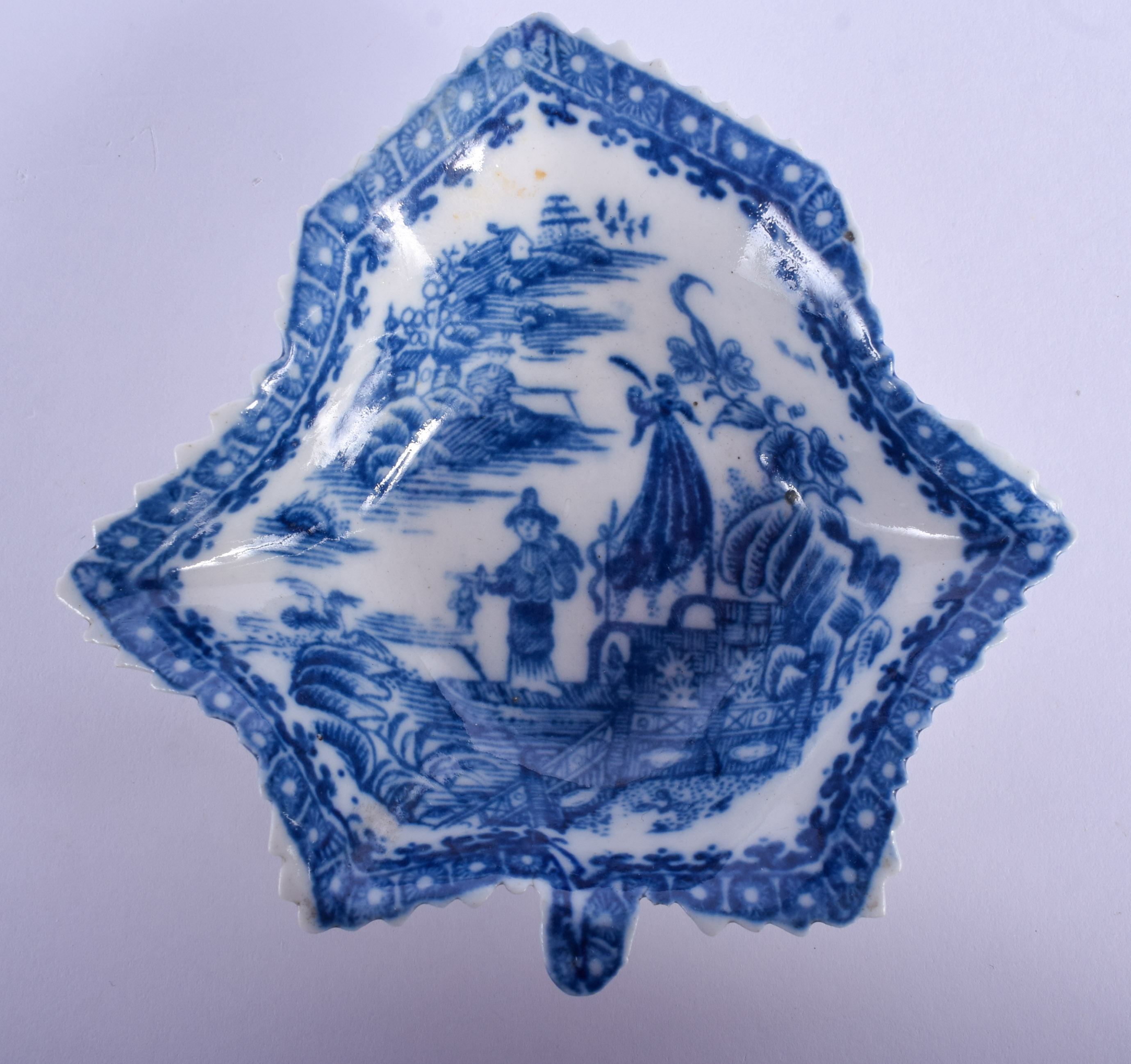 18th c. Caughley leaf shaped dish printed with the Fisherman pattern. 9cm wide