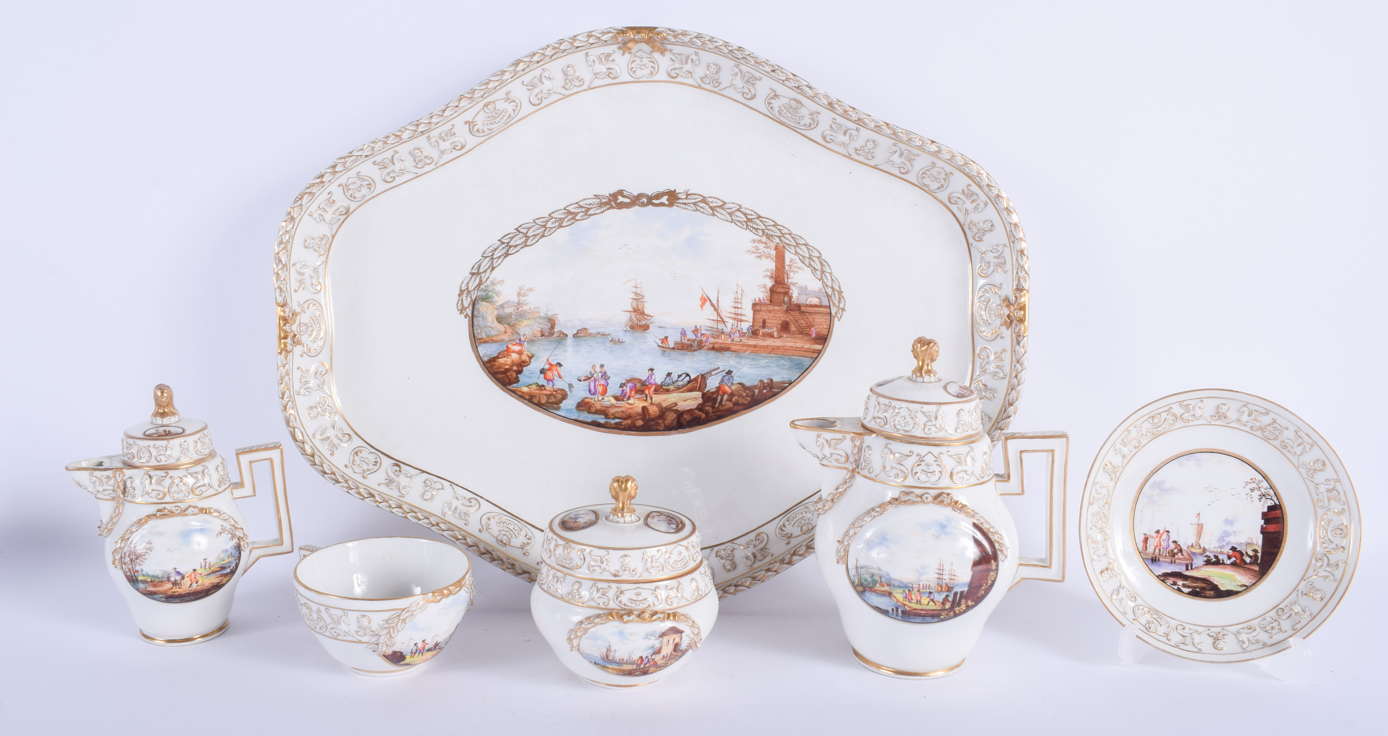 A GOOD 19TH CENTURY MEISSEN PORCELAIN CABARET SET painted with views of Dresden, moulded with motifs