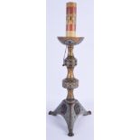 A VERY RARE EARLY FRENCH ENAMELLED BRONZE CANDLESTICK possibly Limoges C1350, decorated with unusual