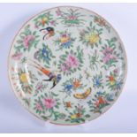 A 19TH CENTURY CHINESE CANTON FAMILLE ROSE PLATE bearing Qianlong marks to base. 23 cm wide.