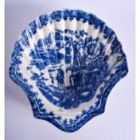 18th c. Liverpool small shell shaped dish printed in blue with the Fisherman pattern. 10.5cm wide