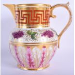 Early 19th c. Coalport jug with Greek key gilding over an orange ground above grapes and pink leaves