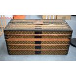 A RARE VINTAGE LOUIS VUITTON TRAVELLING WARDROBE of traditional design with fully fitted interior an