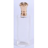 AN ANTIQUE FRENCH 18CT GOLD AND CRYSTAL GLASS SCENT BOTTLE. 8.5 cm high.