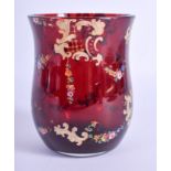 A BOHEMIAN CRANBERRY GLASS BEAKER. 11 cm high.