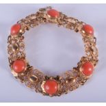 AN 18CT GOLD AND CORAL BRACELET. 17.2 grams. 15 cm long.
