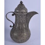 A 19TH CENTURY MIDDLE EASTERN TURKISH SILVER FILIGREE EWER decorated with swirls and foliage. 465 gr