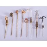 EIGHT ANTIQUE GOLD STICK PINS. (8)