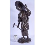 A VERY LARGE EARLY 20TH CENTURY JAPANESE MEIJI PERIOD BRONZE OKIMONO modelled as a female holding he