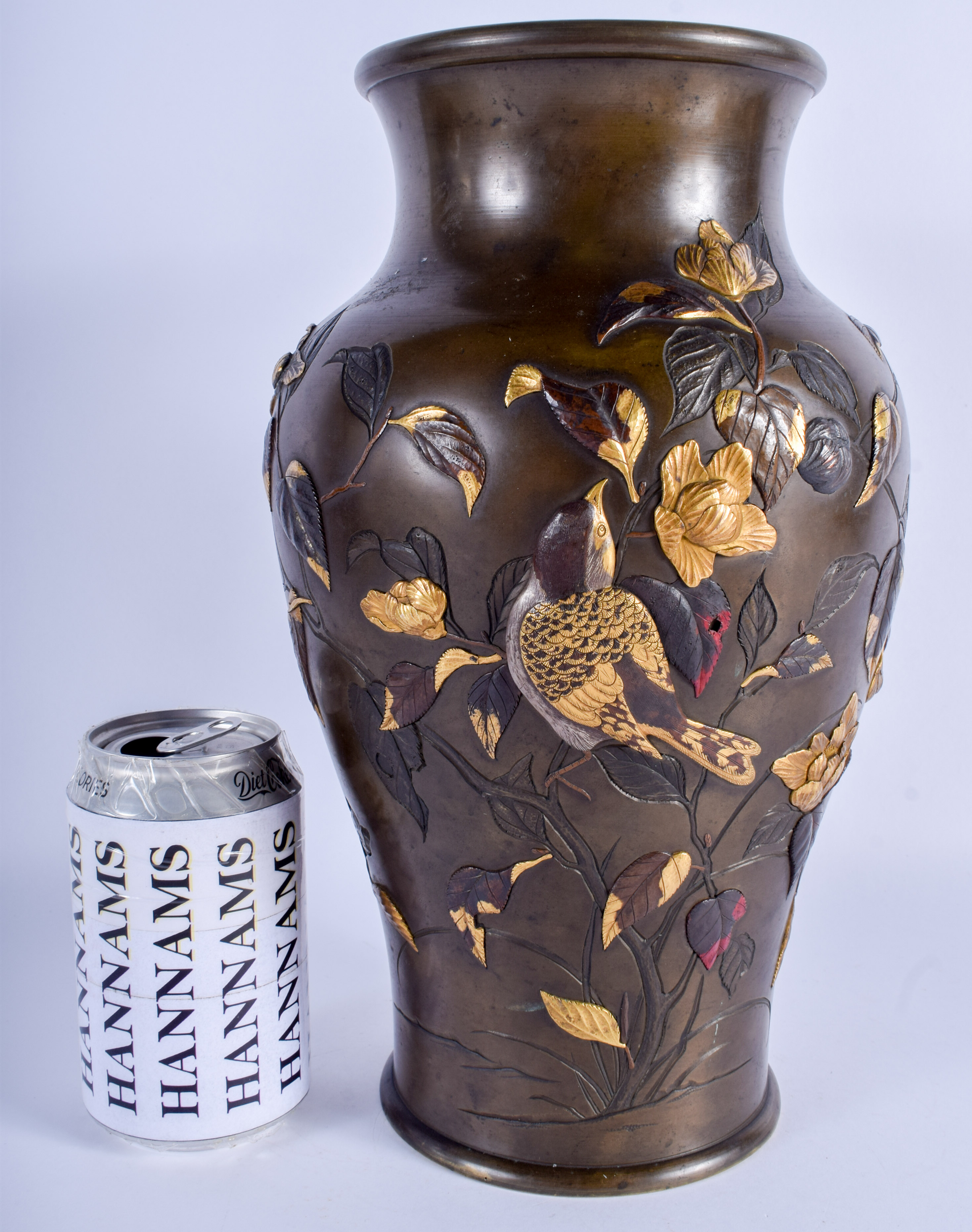 A 19TH CENTURY JAPANESE MEIJI PERIOD BRONZE GOLD ONLAID VASE decorated with birds amongst foliage. 3