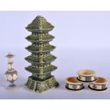 THREE ANTIQUE ANGLO INDIAN IVORY NAPKIN RINGS together with a vase & Chinese tower. (5)