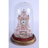 A RARE ANTIQUE MINIATURE FRENCH PORCELAIN CLOCK modelled under a glass dome. Porcelain 12 cm x 5 cm.
