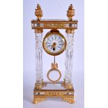 A RARE EARLY 20TH CENTURY FRENCH CUT CRYSTAL AND ORMOLU CLOCK of neo classical form. 31 cm x 11 cm.