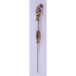 A VICTORIAN 15CT GOLD HAND NOVELTY STICK PIN. 3.6 grams overall.