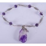 A 1920S WHITE GOLD AND AMETHYST BRACELET. 15 cm long.