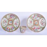A PAIR OF 19TH CENTURY CHINESE CANTON FAMILLE ROSE PLATES together with a cup. 20 cm wide. (3)