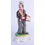 A 19TH CENTURY CONTINENTAL PORCELAIN FIGURE OF A MALE modelled wearing a top hat. 12 cm high.