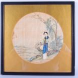 A 19TH CENTURY CHINESE CIRCULAR WATERCOLOUR SILK ROUNDEL depicting a female within a landscape. 19 c