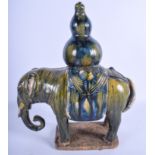 A LARGE CHINESE MAJOLICA EARTHENWARE POTTERY ELEPHANT 20th Century, with drip glazed decoration. 33