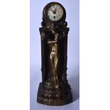 A LOVELY ART NOUVEAU BRONZE MANTEL CLOCK formed as a female holding aloft a mask head. 34 cm x 12 cm