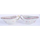 A PAIR OF 18TH CENTURY CHINESE EXPORT FAMILLE ROSE SAUCEBOATS Qianlong. 15 cm wide.