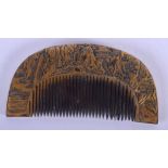 A 19TH CENTURY JAPANESE MEIJI PERIOD LACQUERED TORTOISESHELL COMB decorated with landscapes. 7.5 cm