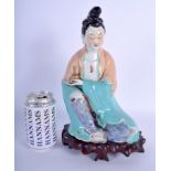 A LARGE CHINESE REPUBLICAN PERIOD PORCELAIN FIGURE OF A FEMALE IMMORTAL upon a fitted stand. Figure