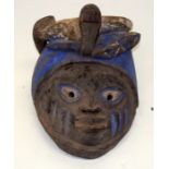 A TRIBAL YORUBA GELEDE HELMET MASK. Nigeria. 18cm x 22cm x 31cm