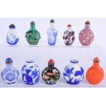 TEN EARLY 20TH CENTURY CHINESE SNUFF BOTTLES in various forms and sizes. Largest 9 cm high. (10)