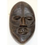 A TRIBAL YACOUBE DAN MASK. Nigeria. 15cm x 8cm x 26cm