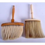 AN ANTIQUE IVORY BRUSH and another. (2)