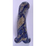 A MIDDLE EASTERN CARVED LAPIS LAZULI DAGGER HANDLE. 11.5 cm long.