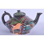 A SOUTH AFRICAN ARDMORE POTTERY TEAPOT AND COVER. 24 cm wide.