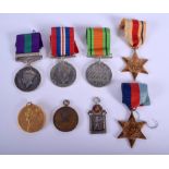 A GROUP OF MILITARY MEDALS one presented to T/36635 Cpl R Reid R A S C (Replacement), together with
