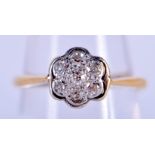 AN ANTIQUE 18CT GOLD AND PLATINUM RING. M/N. 2.7 grams.